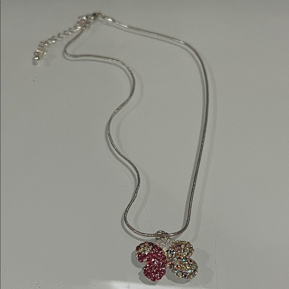 Elegant Silver Necklace with Pink and Gold Accents.